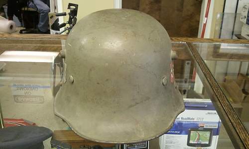 Help in identification and authenticity. SS and swastika green helmet