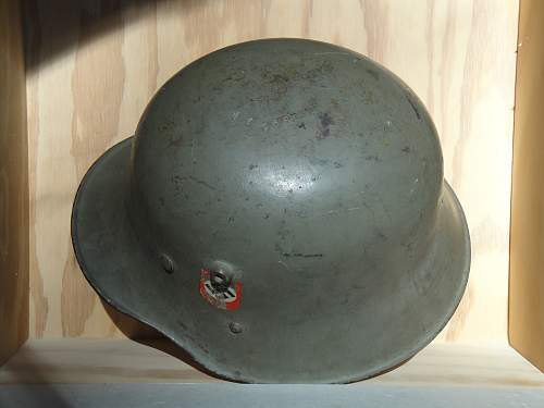 Help in identification and authenticity. SS and swastika green helmet