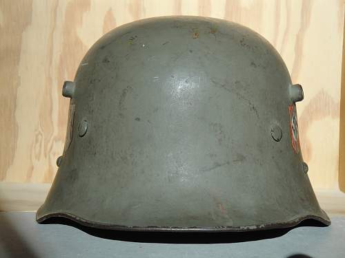 Help in identification and authenticity. SS and swastika green helmet