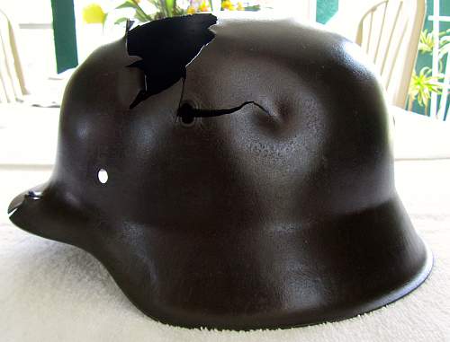 Looking for Opinions on My Battle-Damaged M42 SS Helmet