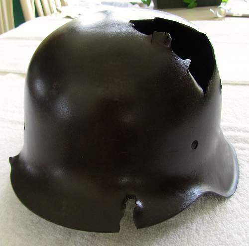 Looking for Opinions on My Battle-Damaged M42 SS Helmet