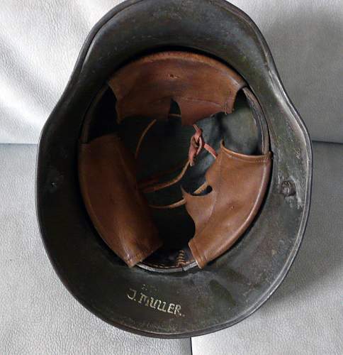 Quist SS Helmet + WW1 Camouflage Helmet ??