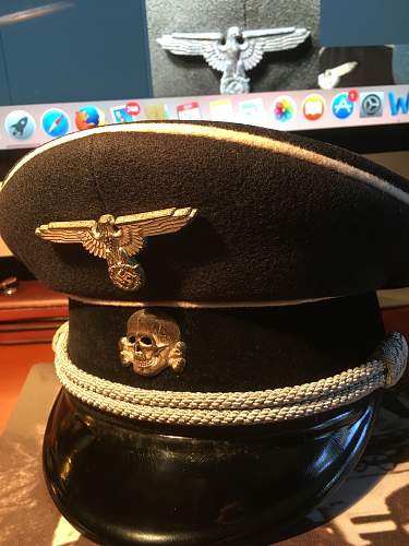 Is this a original SS metal cap insignia eagle and skull ?