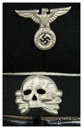 Is this a original SS metal cap insignia eagle and skull ?