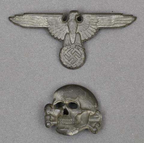 Is this a original SS metal cap insignia eagle and skull ?