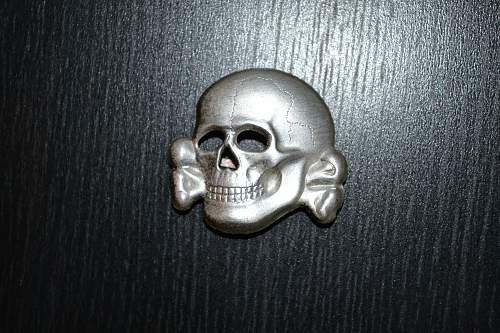 Closed eyes SS cap skull.