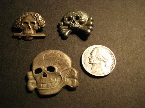 a trio of strange skulls