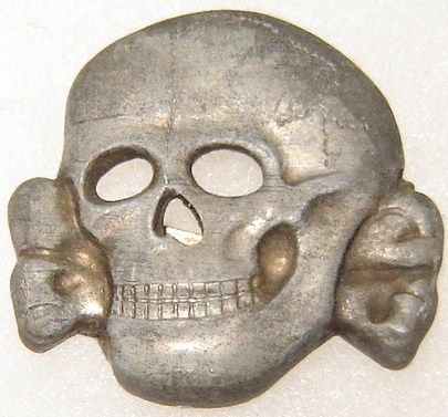 Unmarked Totenkopf .......... repro i believe.(ss 373/43)