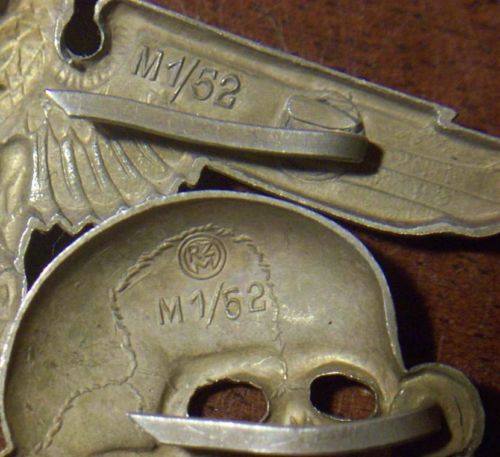 SS Visor Cap Metal Eagle and Skull both marked M1/52- Original??