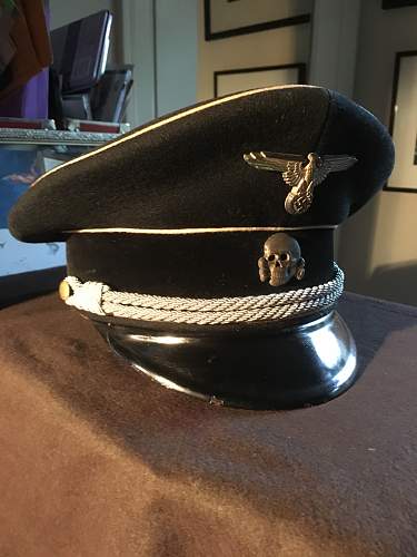 You want a black SS peaked cap?