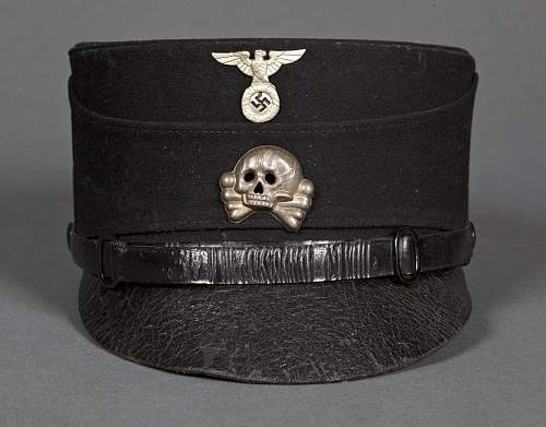 Schaub with cap without piping and the kepi with the leather peak, all in 1932!
