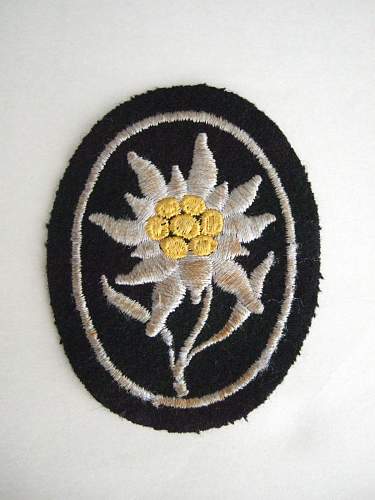 SS Gebirgsjäger edelweiss badge.