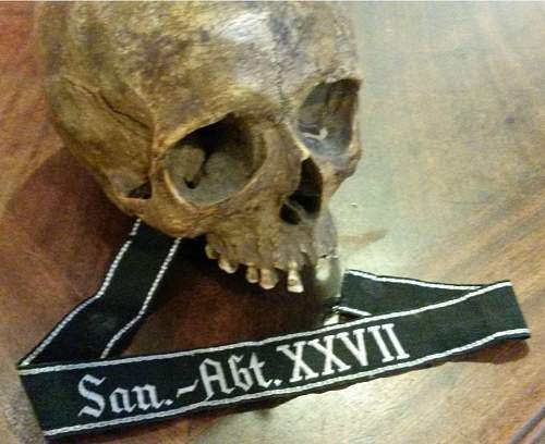 I'd like to get some opinions on this San.-Abt. XXXV cuff title...