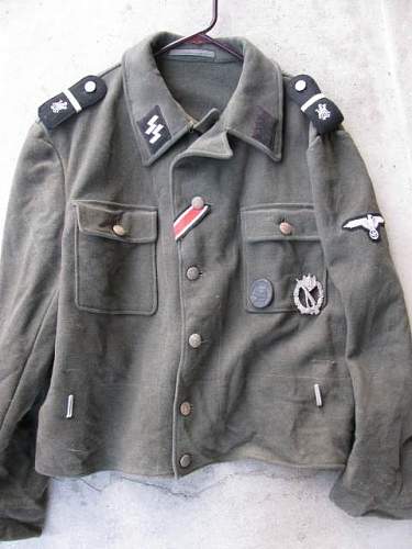 Waffen-SS late M44 model tunic for inspection.