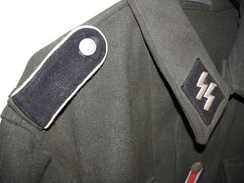 Waffen-SS late M44 model tunic for inspection.
