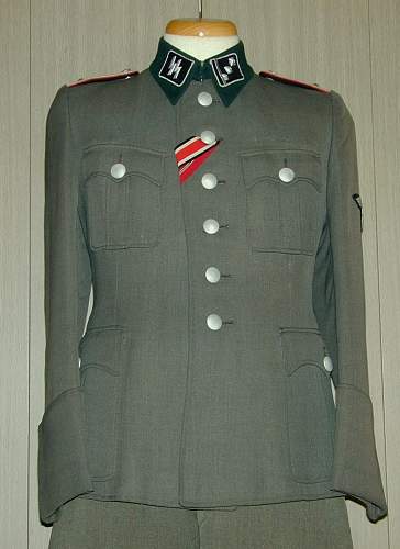 Waffen SS tunic, and breeches for viewing...