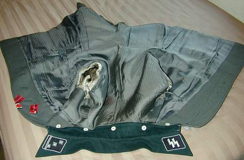 Waffen SS tunic, and breeches for viewing...