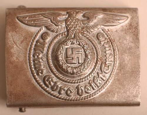 SS belt buckle thought please.