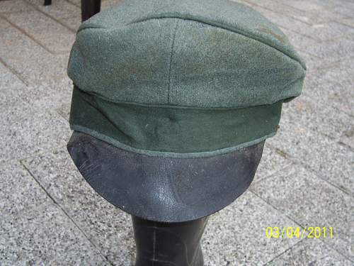 SS and Reichswehr caps, leather peak and novel chin straps