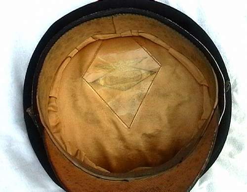 a black SS officer's cap of early make