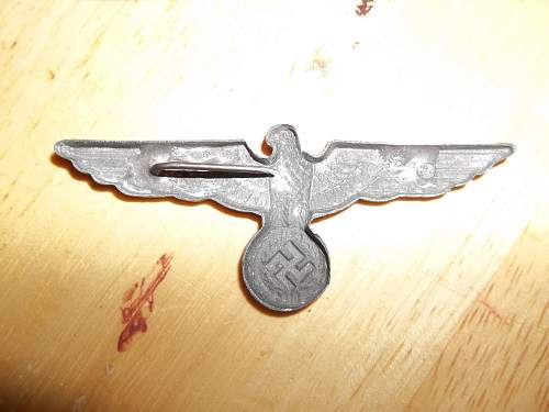 Metal eagle cap insignia, real or fake?