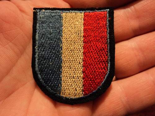French  Vol. sleeve shield, real?