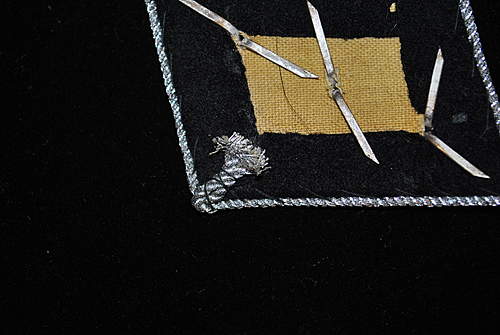 And here's another collar tab... hopefully a real one