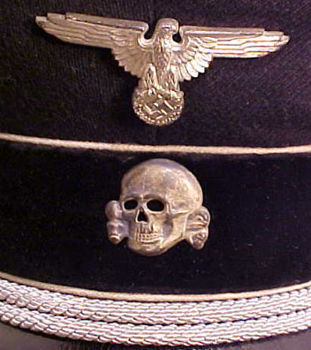 Caps from the Fa. Kornacker, ca. 1938, includes an officer redecorate from enlisted.