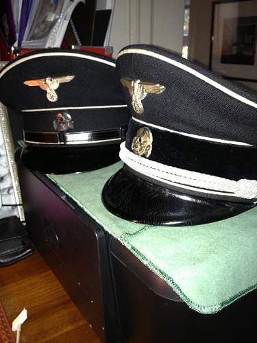 Caps from the Fa. Kornacker, ca. 1938, includes an officer redecorate from enlisted.