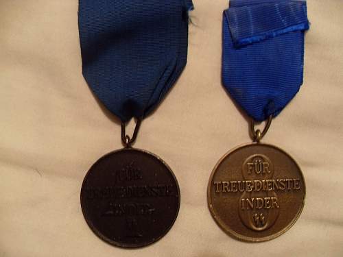 ss 4 &amp; 8 year long service medals