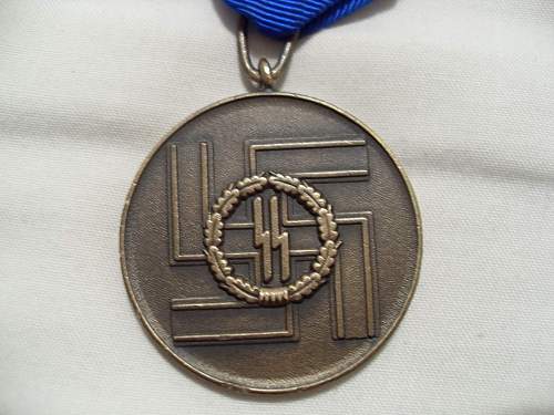 ss 4 &amp; 8 year long service medals