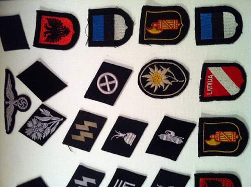 Some of my SS insignia...Enjoy! More to come...