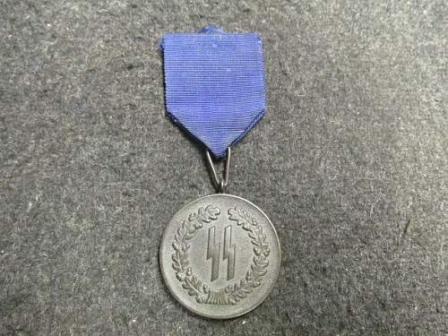 SS 4 year service medal on Gunbroker