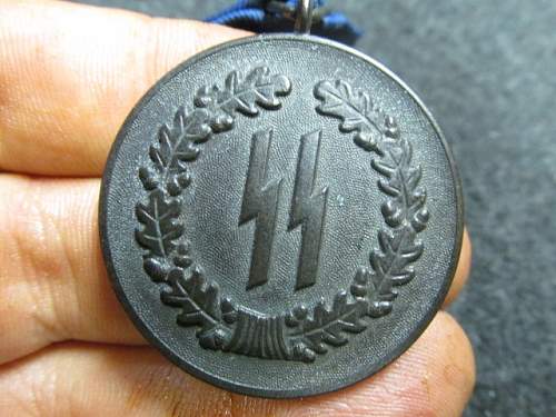 SS 4 year service medal on Gunbroker
