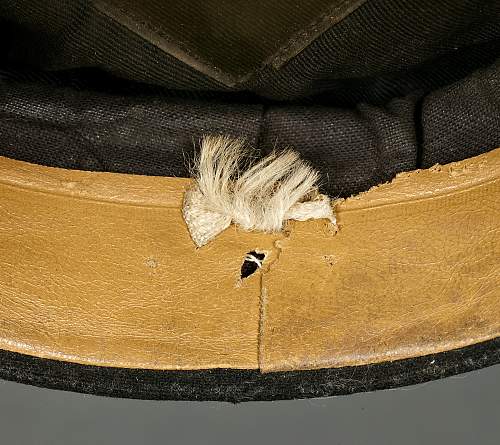 a black SS officer's cap of early make