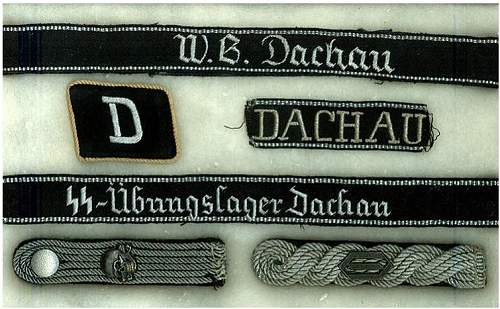 One single D-letter collar tab