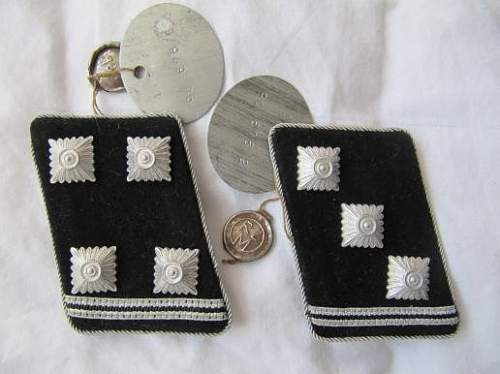 Any of these collar tabs have a chance?