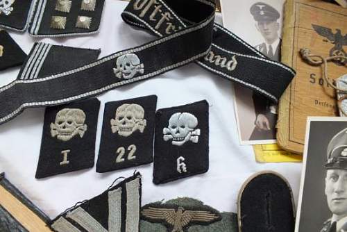 Any of these collar tabs have a chance?