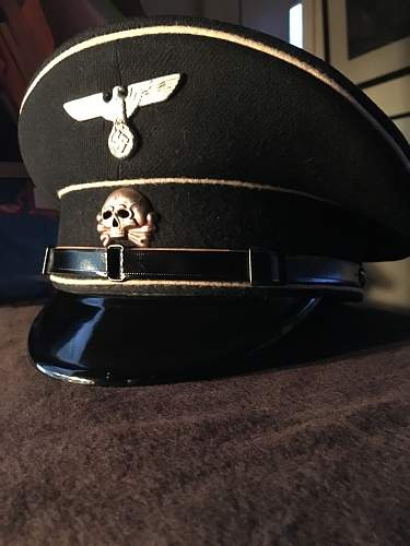 black peaked caps.