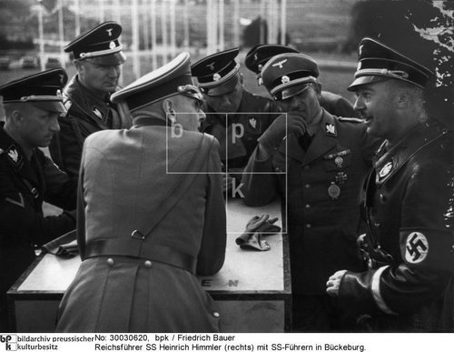 Julius Schreck smiles under his cap