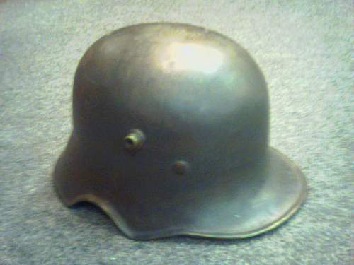 Value of  German M18 ear cut out helmets?
