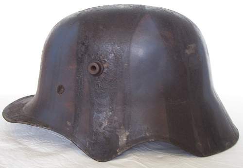 Value of  German M18 ear cut out helmets?