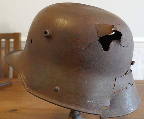 Battle damaged German M16 helmet