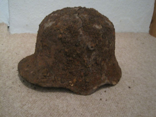 Value of  German M18 ear cut out helmets?