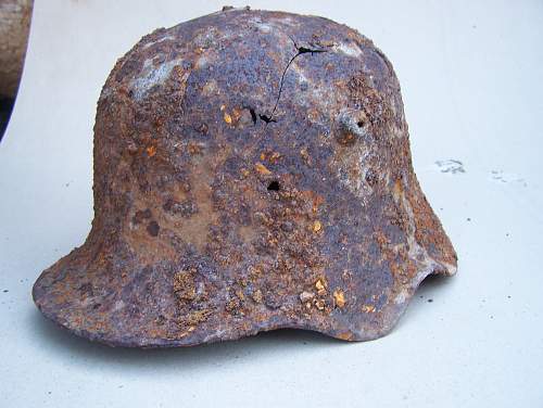 Value of  German M18 ear cut out helmets?