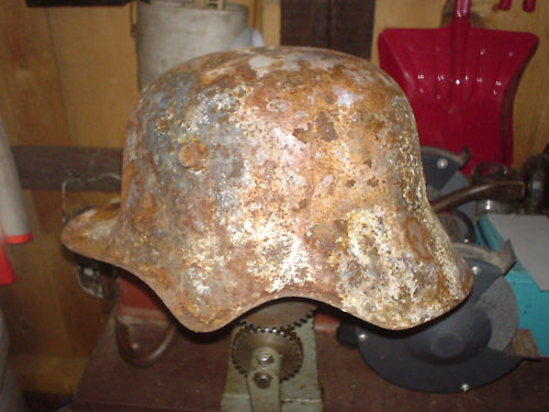 Value of  German M18 ear cut out helmets?