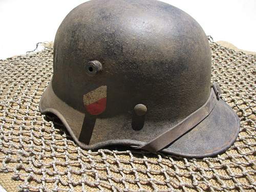 Value of  German M18 ear cut out helmets?