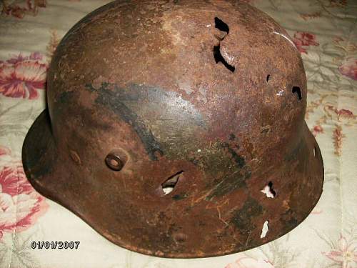 Source for WWI Imperial German Helmet/Relic/Battle Damaged