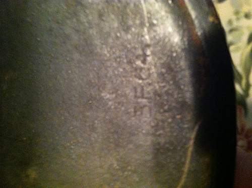 Need opinions on this German m16 helmet with bullet hole