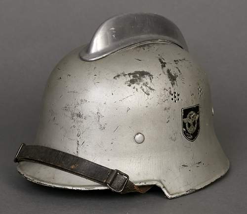 GERMAN MODEL 1934 FIRE POLICE CIVIC  HELMET,  Silver painted.